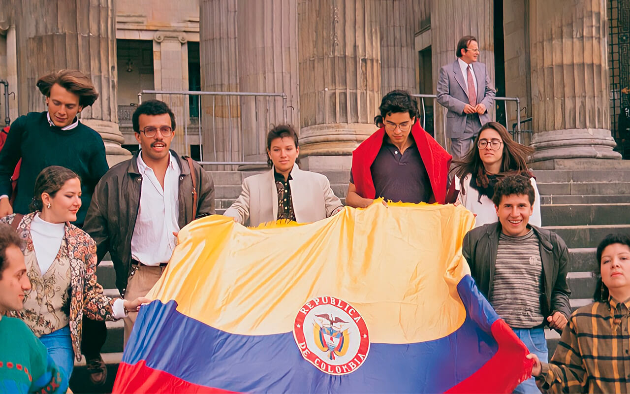 Participantes séptima papeleta con bandera de Colombia